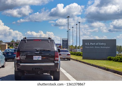 US/Canada Border, Peace Arch, Washington State, USA - September 20, 2018: Busy Border Crossing Between US And Canada.  