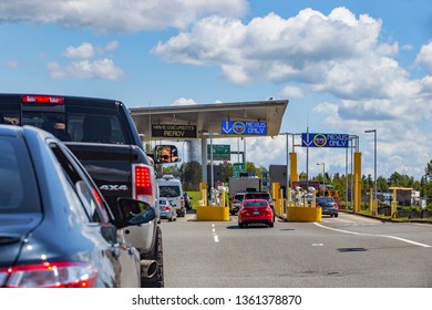 US/Canada Border, Peace Arch, Washington State, USA - September 20, 2018: Busy Border Crossing Between US And Canada.  