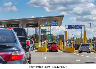 US/Canada Border, Peace Arch, Washington State, USA - September 20, 2018: Busy Border Crossing Between US And Canada.  