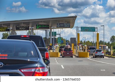 US/Canada Border, Peace Arch, Washington State, USA - September 20, 2018: Busy Border Crossing Between US And Canada.  