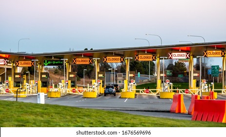 US/Canada Border, Peace Arch, Washington State, USA. Empty Border Lanes At Crossing Between US And Canada.