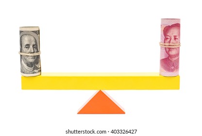 Usd And Rmb Balance On Teeterboard On White Background