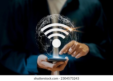 Use business smartphone with wifi icon, business communication social network concept.	 - Powered by Shutterstock