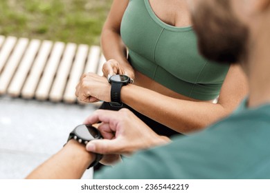 Use a fitness app for sports. Fitness workout friends.    Runners together are a woman and a man athletic. Mental health young people wanting a workout.