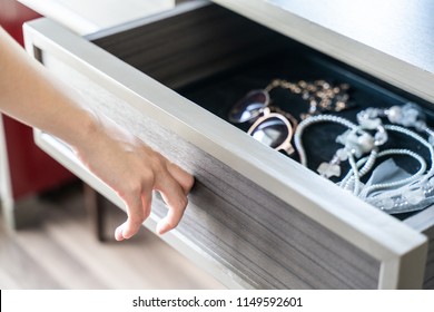 Use Hand Pull Open Drawer Wooden , accessories and jewelry inside.