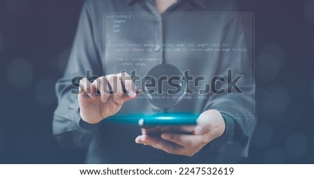 Use magnify glass search for binary programming code. Software coding concept. Cyberspace development script for digital security web online. Computer language connection, html, java, css. Programmer.