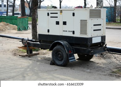 Use a mobile diesel generator with the repair of the road.