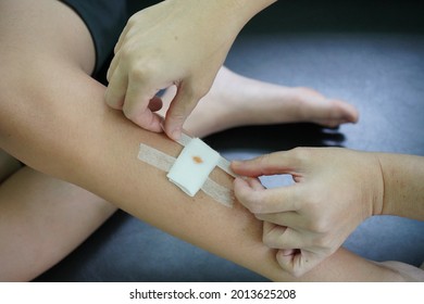 Use Plaster To Cover The Wound On The Boy's Leg. Accidents, Wounds, Wound Healing, Self-injury , Hurt , Aid , Kid