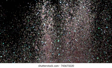 With the use of Realistic Glitter Exploding on Black Background. These clips are perfect for visual effects, compositing, and motion graphics. Use blending mode (screen).