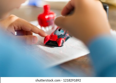 Use Red Nail Polish. Painting Children's Toys.