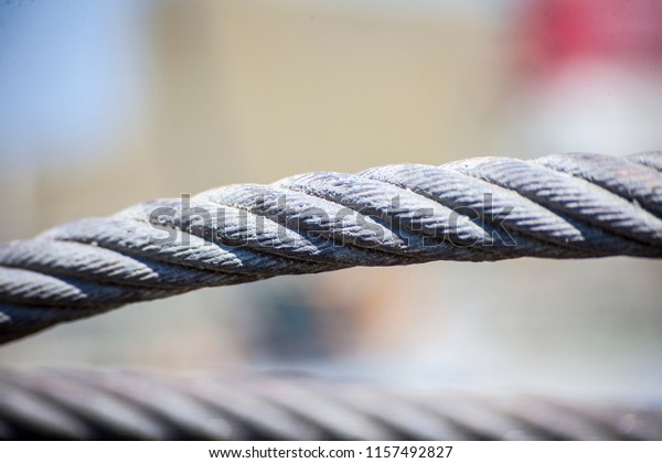 The use of steel cables is frequently used in the\
construction industry. It is a steel rope used in the picture\
cranes.