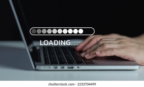 Use your computer to download the program and wait for it to load. loading bar symbol Businessman downloading digital business data form website and cloud to laptop