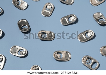 Used aluminium ring pull tabs.