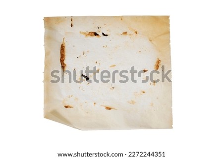 Used baking paper isolated on white background, sheet of baking paper after baking