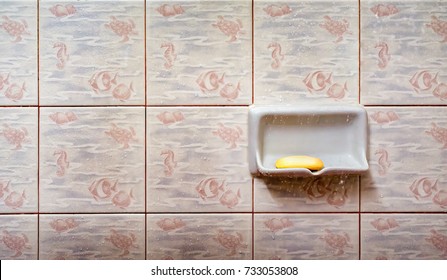 A Used Bar Soap On A Soap Tray In The Shower