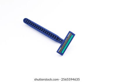 Used blue manual mustache and beard trimmer tool, isolated on white background with slightly rusty and blunt razor blade