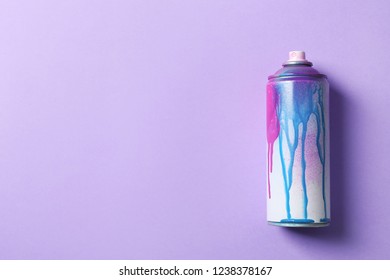 Used Can Of Spray Paint On Color Background, Top View. Space For Text