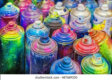 used cans of spray paint