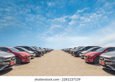 Lot of used car for sales in stock with sky and clouds - Shutterstock ID 2281237139