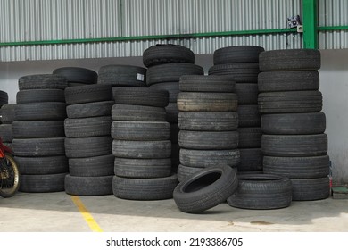 Used Car Tires Pile In The Tire Repair Shop Yard