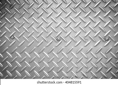 Used checkered steel plates background - Black and White