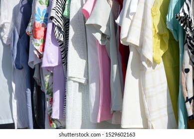 Used clothes at the flea market in La Nucia, Alicante province, Costa Blanca, Spain, October 14, 2019 - Shutterstock ID 1529602163