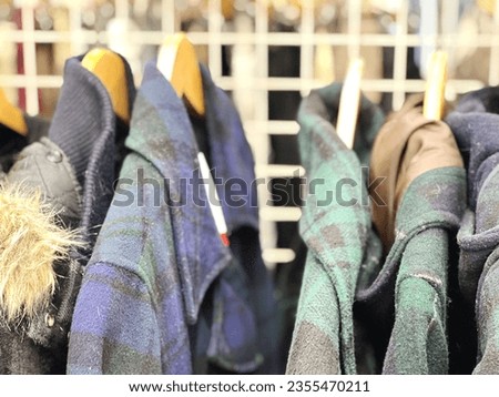 Used coats lined up at the store