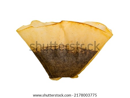 Used coffee filter isolated on white