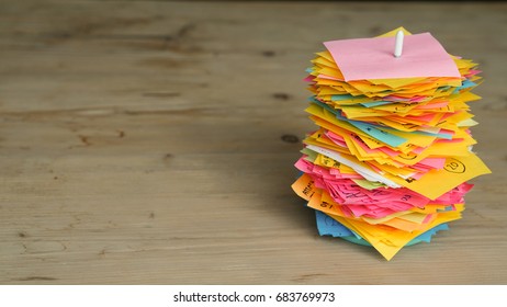 Used Colorful Post-it Notes Stack In Stick White Pike, Put On The Wooden Table Work Space