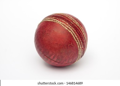 A Used Cricket Ball Isolated On White