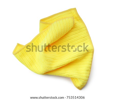 Used crumpled yellow rag isolated on white background
