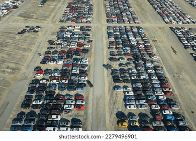 Used damaged cars on auction reseller company big parking lot ready for resale services. Sales of secondhand vehicles for rebuilt or salvage title - Shutterstock ID 2279496901