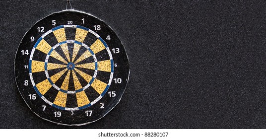 Used Darts Board With Lots Of Holes