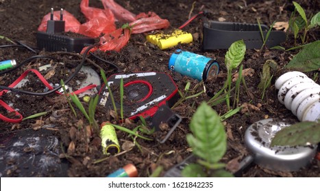 Used Electronics In A Landfill. Waste Electrical And Electronic Equipment. Air Pollution, Water Pollution, Soil Pollution By Toxic Heavy Metals