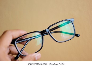 used glasses The image is sharp and close. It is a good background suitable for using blue glasses. Work concepts and eye health