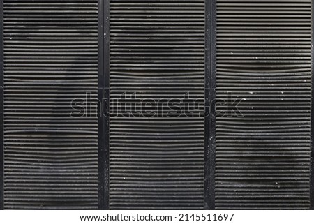 used metal grid shutter , iron material , metallic texture