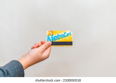 Used New York Metro Card Holding Young Boy Kid Child Hand. Metro Card New York City Subway Paying Fare Turnstile MTA Transit System Commute.Copy Space.Indoors Shot.Telsiai,Lithuania 22-12-2021