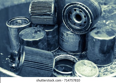 Used Oil Purification Filters On The Dirty Surface Of The Barrel With A Shallow Depth Of Field