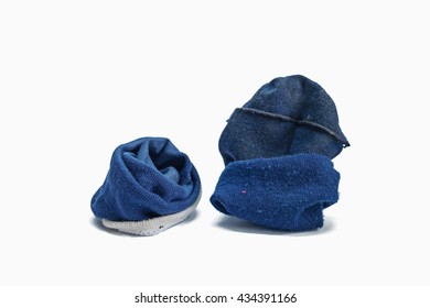 Used Old blue socks isolated on white background