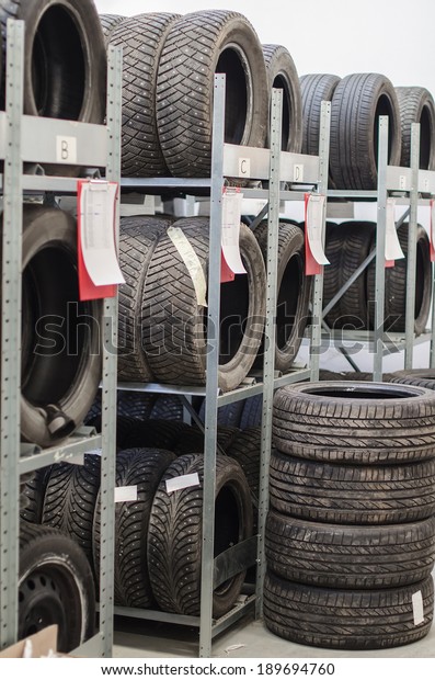 Used old car tires at\
warehouse.