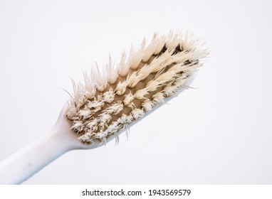 Used Old Toothbrush Isolated On A White Background.