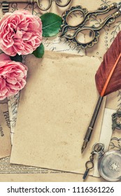 Used Paper, Antique Feather Pen, Rose Flowers. Vintage Style Toned Picture