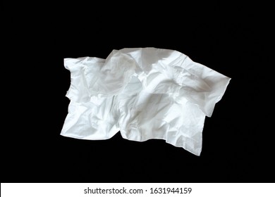 Used Paper Napkin Isolated On Black Background. Crumpled Tissue