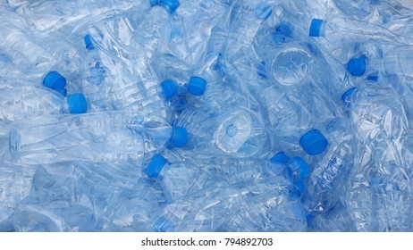 Used plastic bottles waiting to be recycled. - Shutterstock ID 794892703