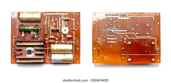 Used Retro Electronic Low Frequency Amplifier Board For Old School Tape Recorder. Powerful Transistor On The Heatsink. Large Capacitors. Isolated On White Background.