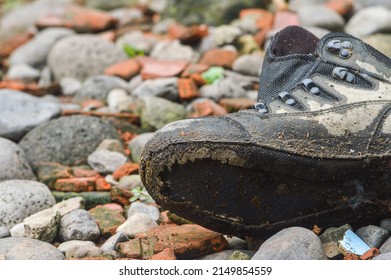 Used Shoes Thrown On Cobblestones Stock Photo 2149854559 | Shutterstock