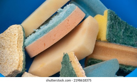 Used Sponges In Plastic Basin