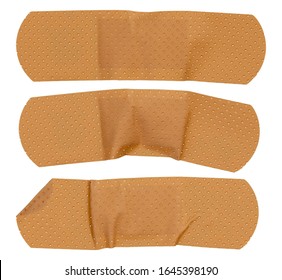 Used sticking plasters isolated on white background. Medical plasters.