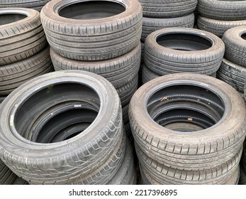 Used tires, stored in piles - Shutterstock ID 2217396895