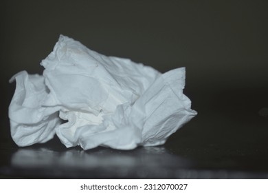 used tissue on the table - Shutterstock ID 2312070027